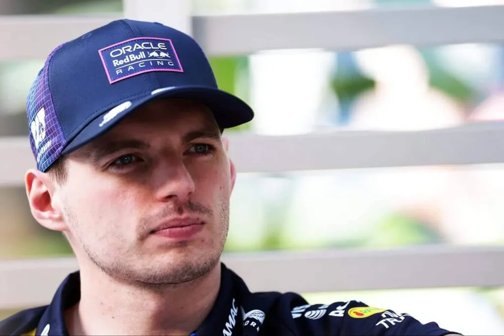 Max Verstappen in a cap from the shoulders up